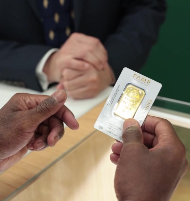 Sell Gold Man holday gold bar, selling the item for cash.